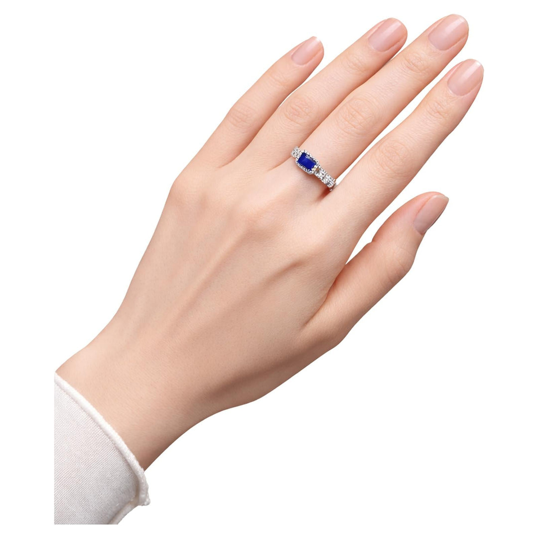 Emerald Cut Tanzanite & Diamond Halo Chain Ring