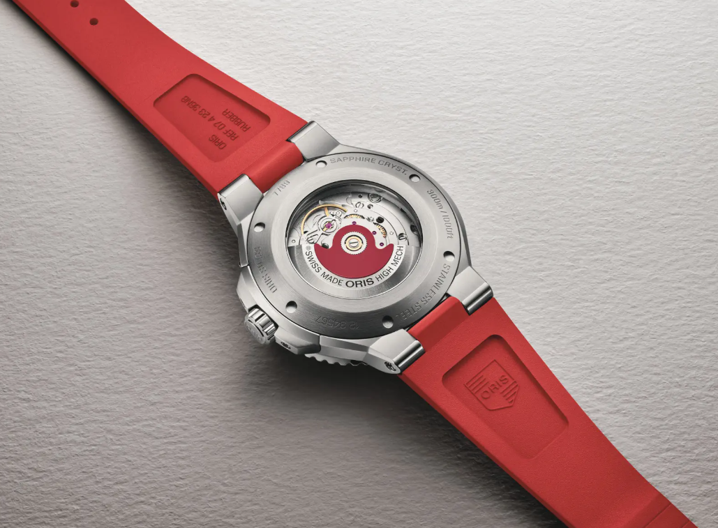 Aquis Date Relief Black/Red Rubber Black Dial