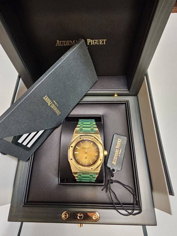 Audemars Piguet ROYAL OAK 39MM SMOKED YELLOW GOLD-TONED DIAL 18K YELLOW GOLD JUMBO EXTRA-THIN 16202BA.OO.1240BA.02 MENS WATCH