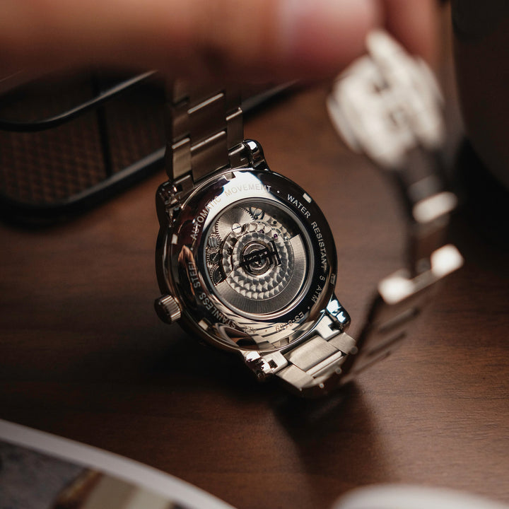 Heritage Longcase Double Retrograde Calendar Open Heart Automatic Black / Stainl