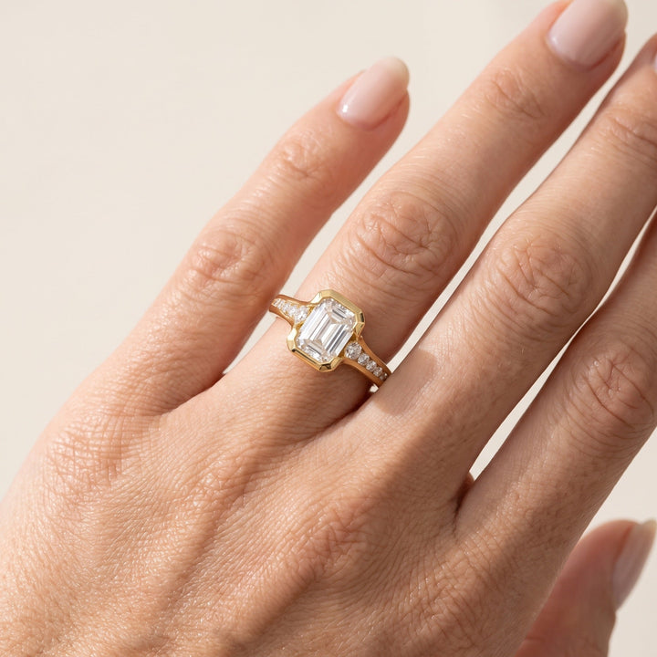 Emerald Cut Accent Shoulder Ring