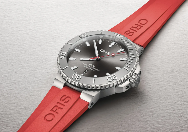 Aquis Date Relief Black/Red Rubber Black Dial