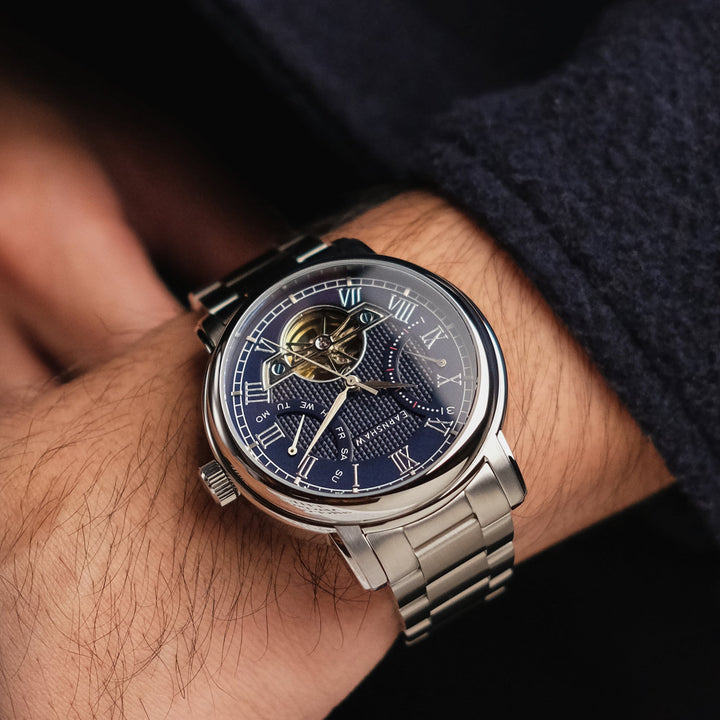 Heritage Longcase Double Retrograde Calendar Open Heart Automatic Blue / Stainle