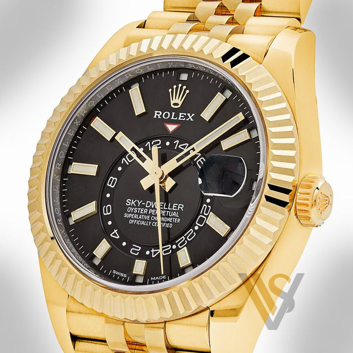 Brand New Rolex - Sky-Dweller - Black Index Dial - 18K Yellow Gold - Jubilee Bracelet