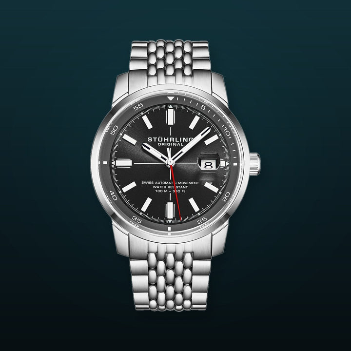 Trackmaster 1026 Automatic Men’s 42mm Sunray Teal Dial/Gray Inner Ring/Stainless Steel Bracelet